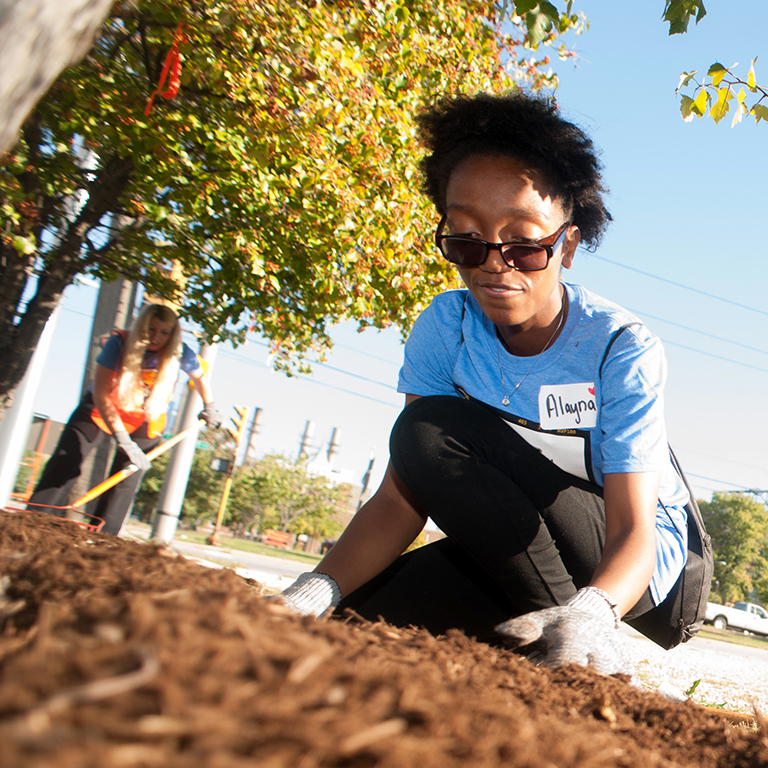 SPEA students work in a city garden.