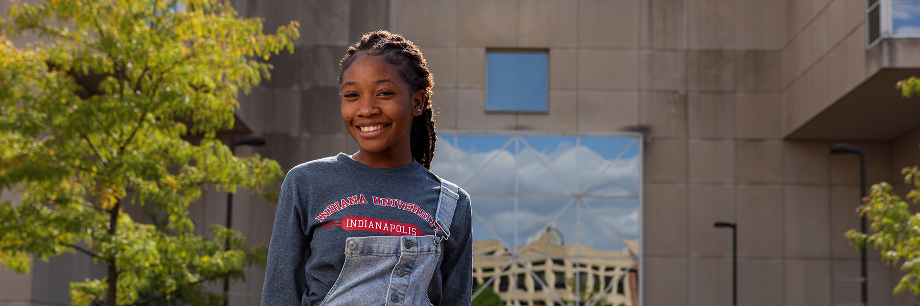 Student with IU Indianapolis shirt smiling