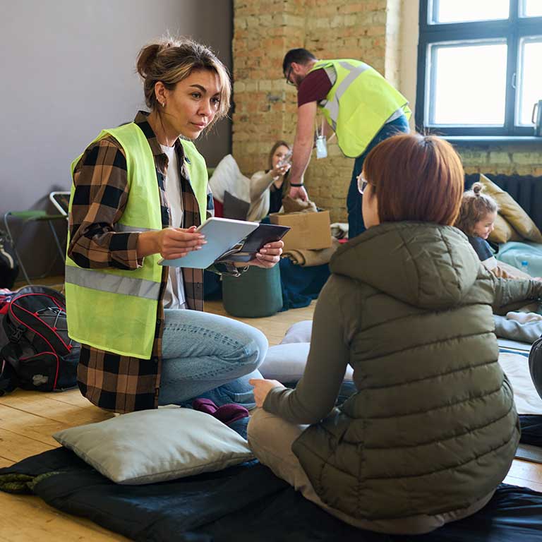 Stock photography of people in a homeless shelter. 
